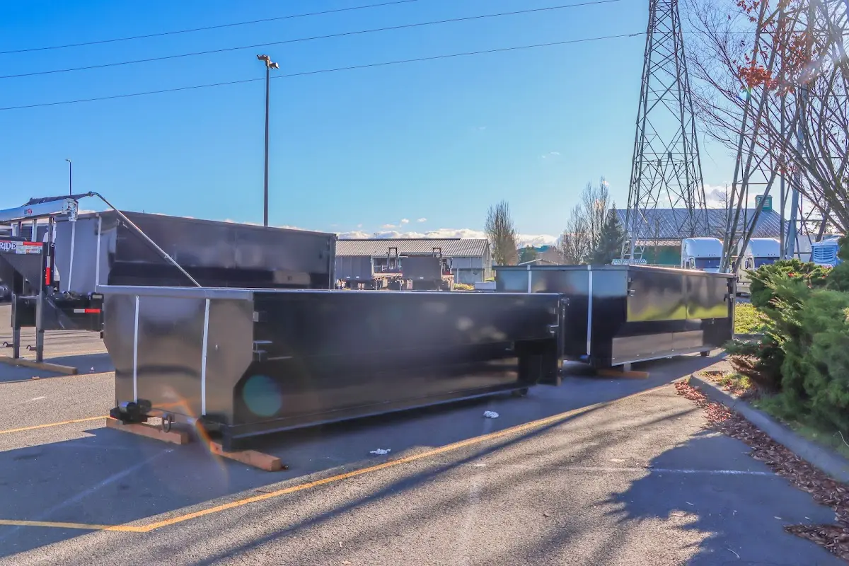 Roll-off dumpster ready for waste disposal at job site for 2 Yard Dumpster Rental in Franklin